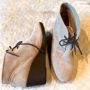 Crocs Dual Comfort Leigh booties. Size 10. Never worn. Suede. Lace-up wedge.